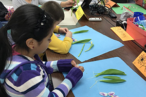 photo of students learning about flowers