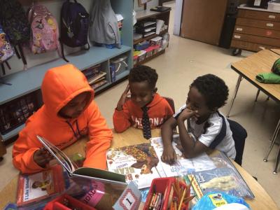 photo of students reading together